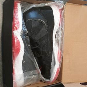 Size 11 air Jordan 11 retro black,red,white shoes